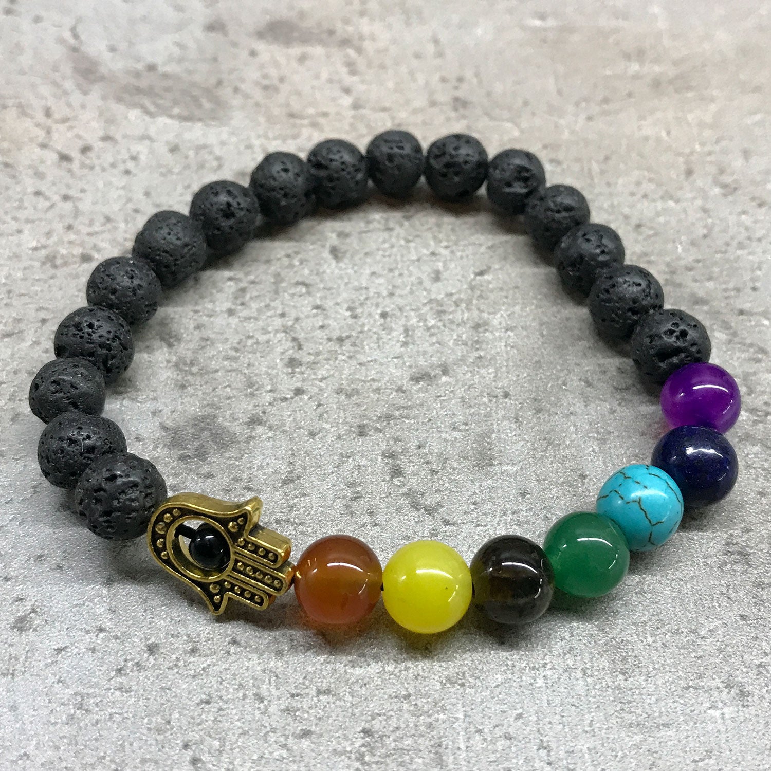 Pulsera de Lava y Chakras - Hamsa Dorada