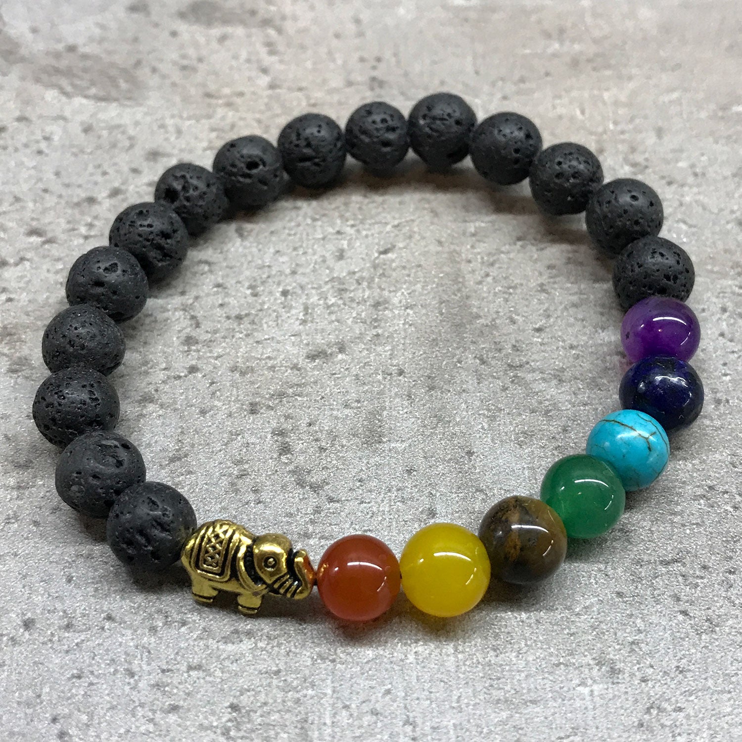 Pulsera de Lava y Chakras - Elefante Dorado